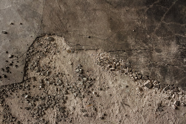 黑色水泥开裂背景图片下载