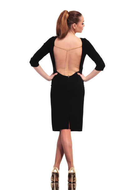 一个性感的金发女商人的全身后视图图片下载