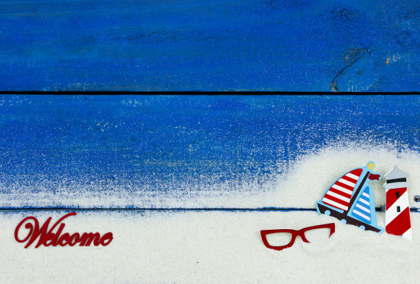 带沙边的蓝色海滩标志图片下载