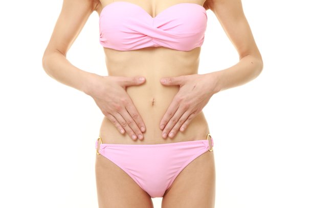 女人用手捂着肚子图片下载