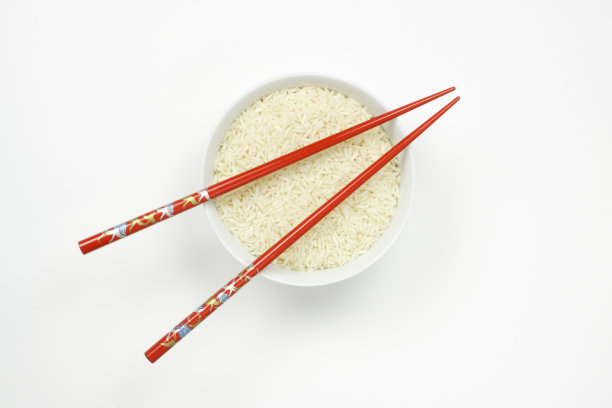 一碗用筷子夹的米饭图片下载