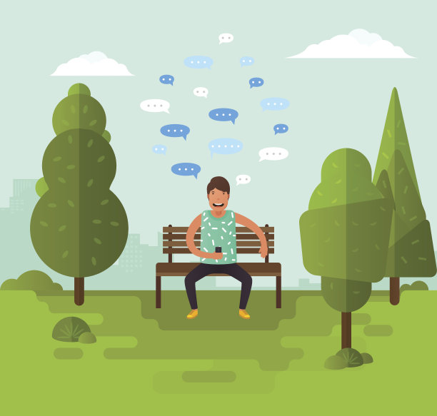 一个年轻人坐在公园的长椅上图片下载