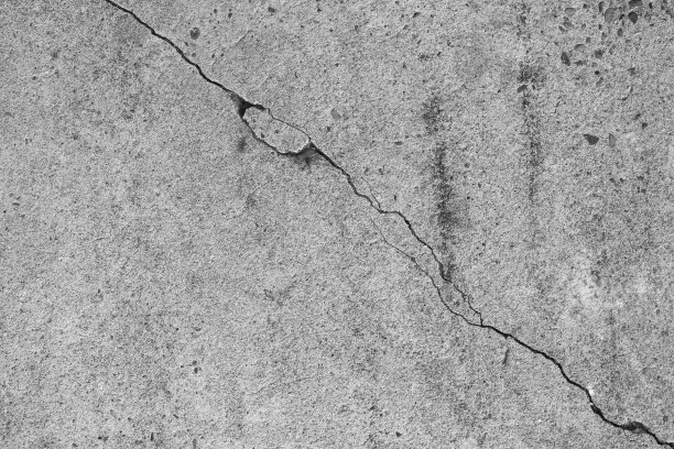 裂缝混凝土表面背景。图片下载
