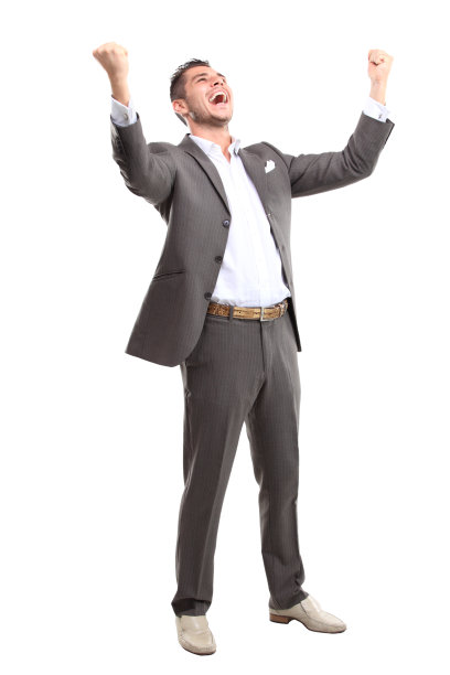 兴奋的英俊的商人举起手臂成功图片下载