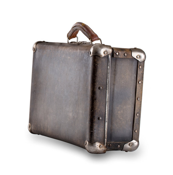 站在一个角皮革旧手提箱图片下载