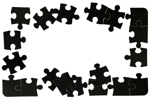 黑色拼图碎片形成框架在白色的背景图片下载