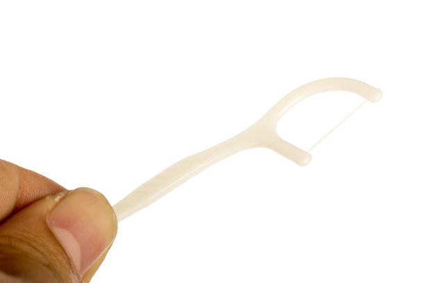 手持牙签牙线图片下载