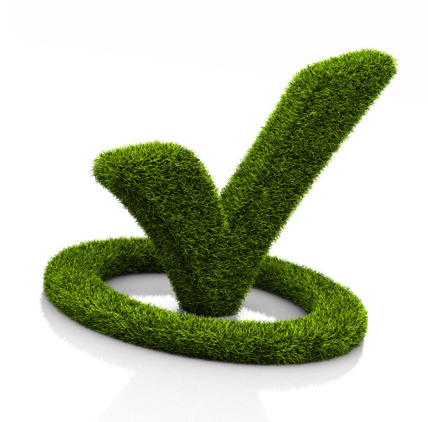 绿草勾号符号在白色的圆圈上图片下载