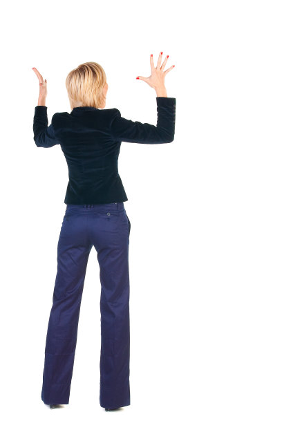 震惊的金发女商人。后视图片下载