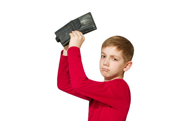 不幸的男孩显示老空钱包孤立在白色图片下载