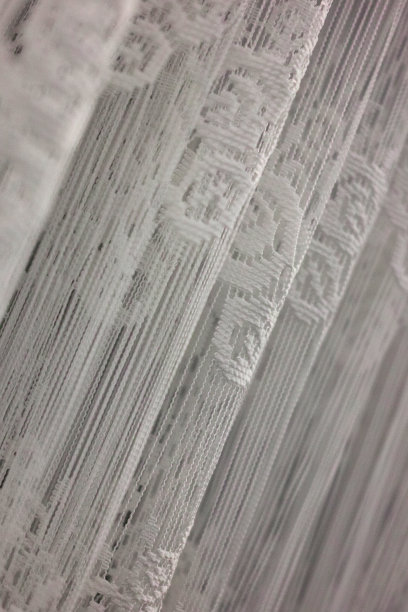 细节的一个白色窗帘与花边花图片下载