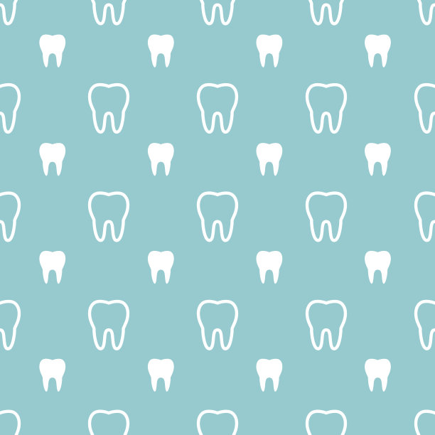 白色的牙齿在绿松石背景。素材图片