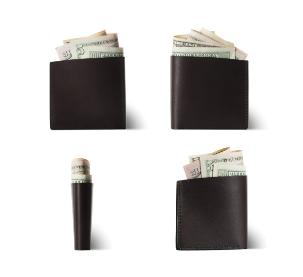 零用钱美元在棕色的皮革钱包孤立的白色背景图片下载