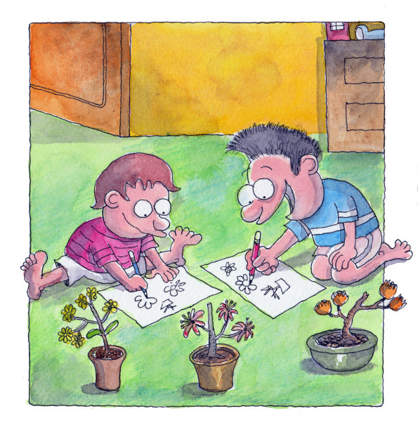 男孩们在地板上画画素材图片