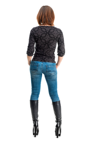 背部高架的苗条女孩在高跟鞋图片下载