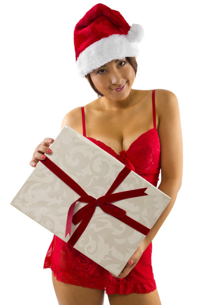 性感女人在内衣与一个惊喜的圣诞礼物图片下载