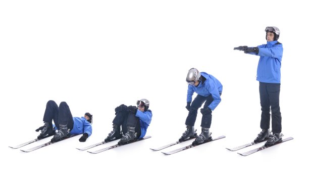 滑雪者演示滑雪的热身运动。图片下载