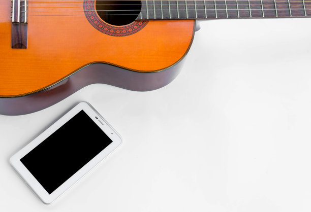 吉他与平板电脑图片下载