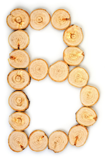 由木片在白色背景上制成的字母。图片下载