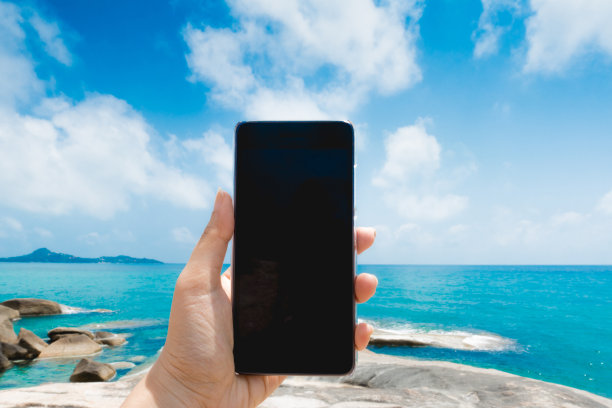 拍一张蓝天海景的照片图片下载