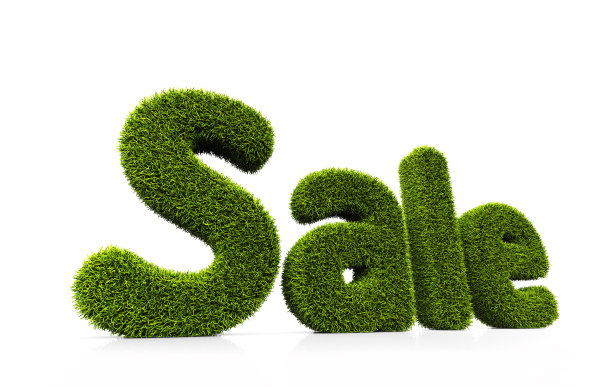 绿草象征销售孤立在白色图片下载