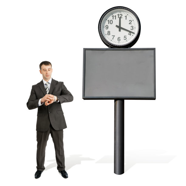 商人看着他在大钟旁的指针图片下载