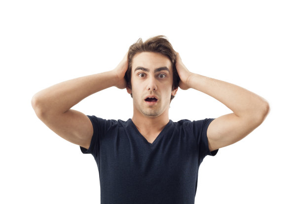 惊讶的年轻人手牵着头图片下载