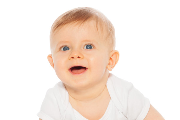 白色背景上笑着的婴儿的肖像图片下载