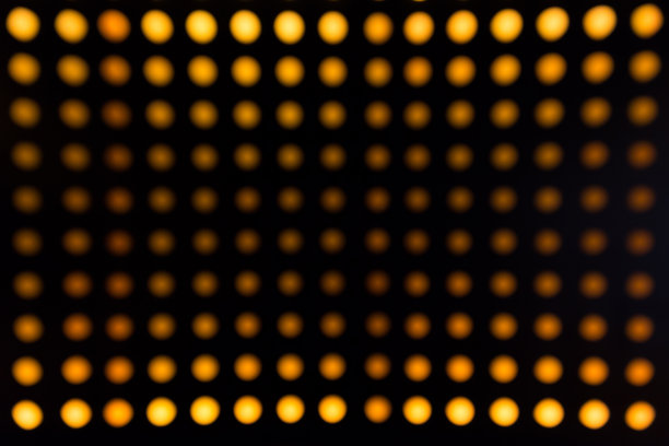 橙色背景的圆光散焦模糊散焦图片下载