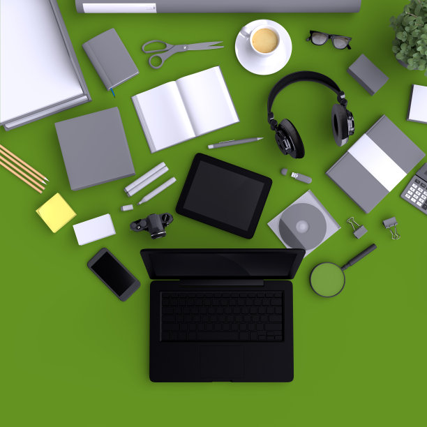 笔记本电脑和各种空白办公用品。图片下载