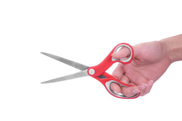 手持剪刀。图片下载