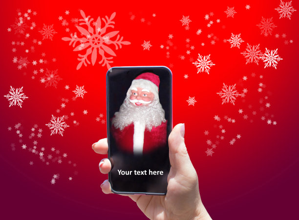 圣诞老人在智能手机上的红色背景图片下载