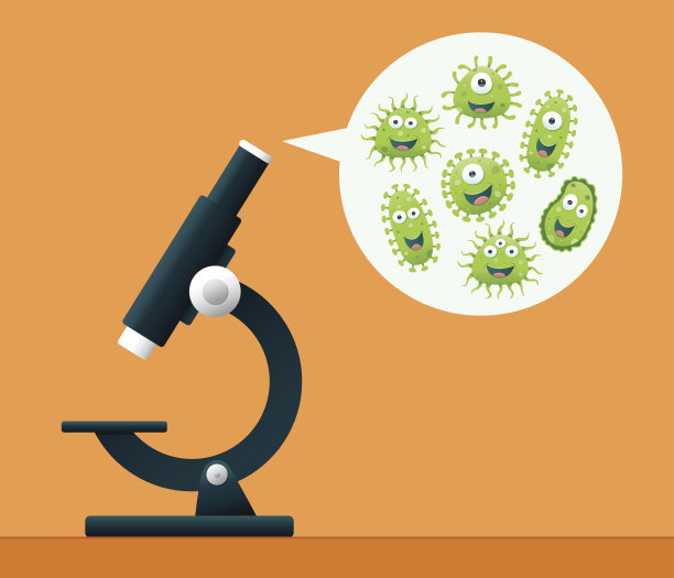 显微镜和一组细菌在橙色背景下素材图片