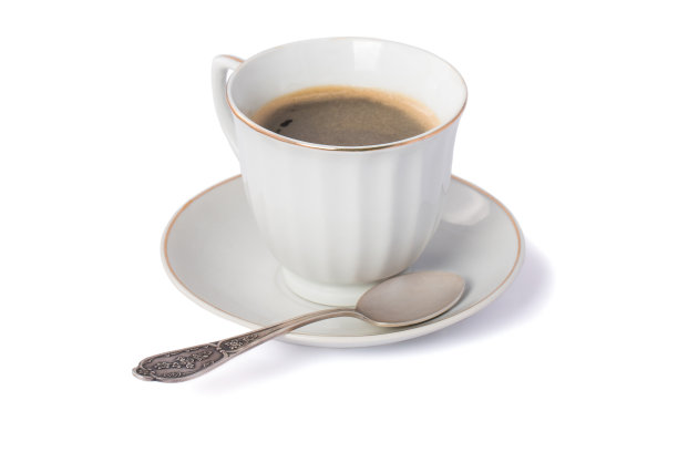 一杯用银匙舀的咖啡图片下载
