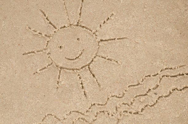 太阳在沙子上绘图图片下载