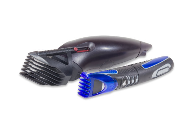 剪发器和理发器在一个轻的背景图片下载