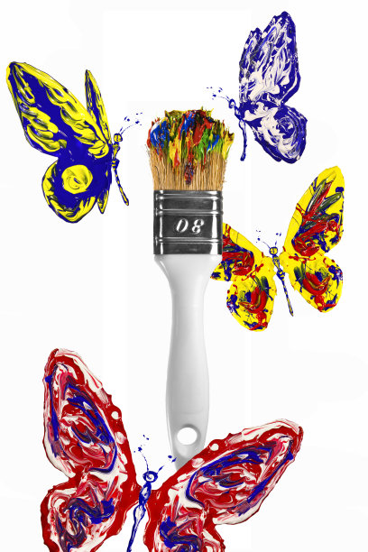 红蓝黄的蝴蝶在画笔上飞舞图片下载