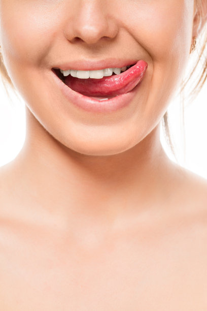 美丽的宽微笑的年轻新鲜的女人图片下载