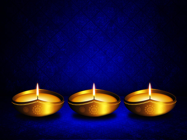 在黑暗的背景上放置排灯节问候的油灯图片下载