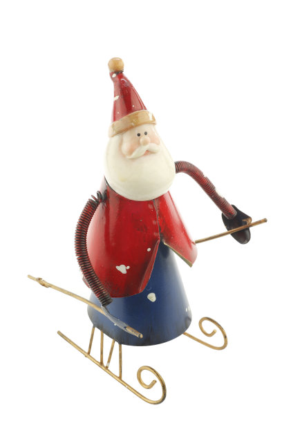 老式的金属圣诞老人形象在雪橇上图片下载