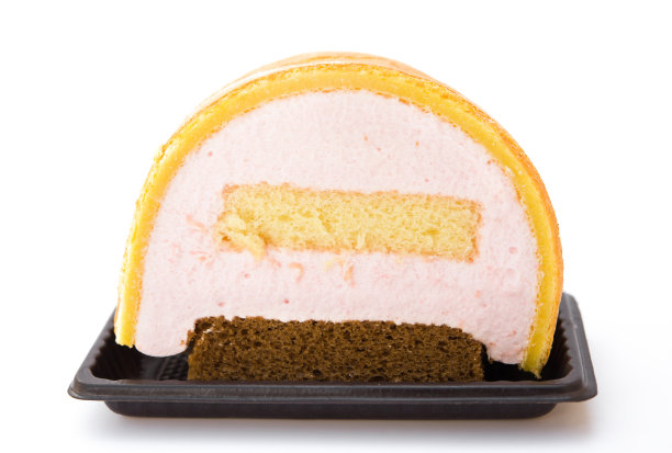 前视图美味的蛋糕在一个白色的背景图片下载