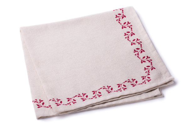 折叠的餐巾孤立在白色背景上图片下载