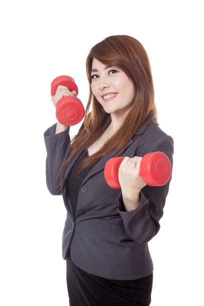 亚洲女商人举起哑铃微笑图片下载