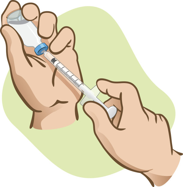 急救人员用注射器取下安瓿中的内容物图片下载