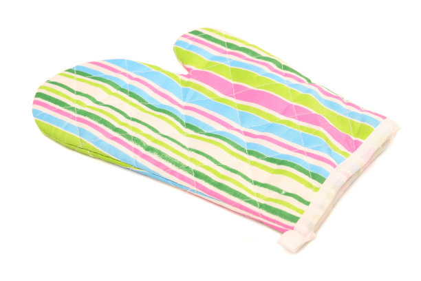 厨房保护手套的特写在白色的背景图片下载