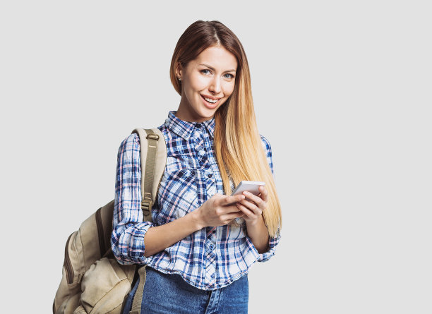 快乐年轻的学生女孩肖像图片下载