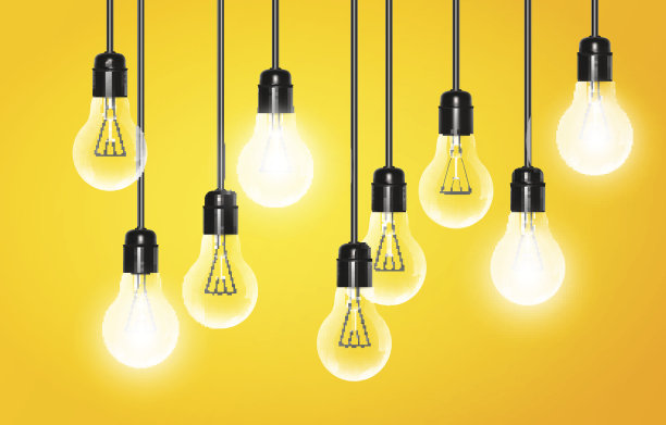悬挂着一些在黄色背景上发光的灯泡图片下载