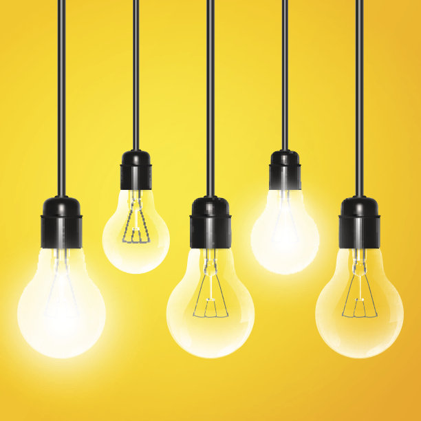 悬挂着一些在黄色背景上发光的灯泡图片下载