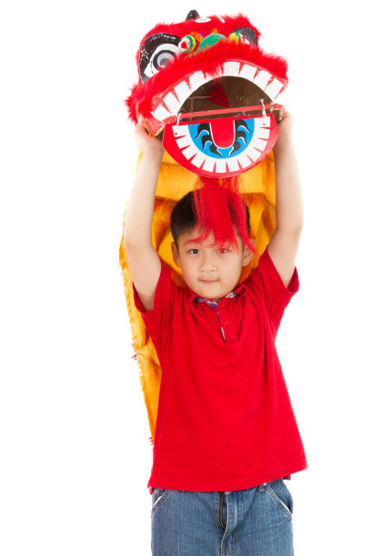 亚洲小男孩在中国狮子习俗舞蹈图片下载