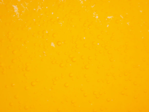 抽象模糊的桔黄色气泡的冒泡水图片下载